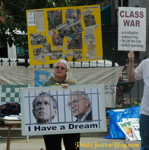 picture of Bush and Chney behind bars with "I have a dream"